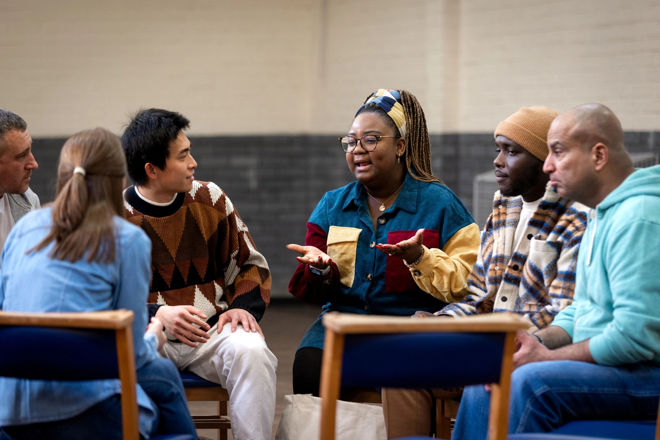 Community members in a collaborative discussion circle
