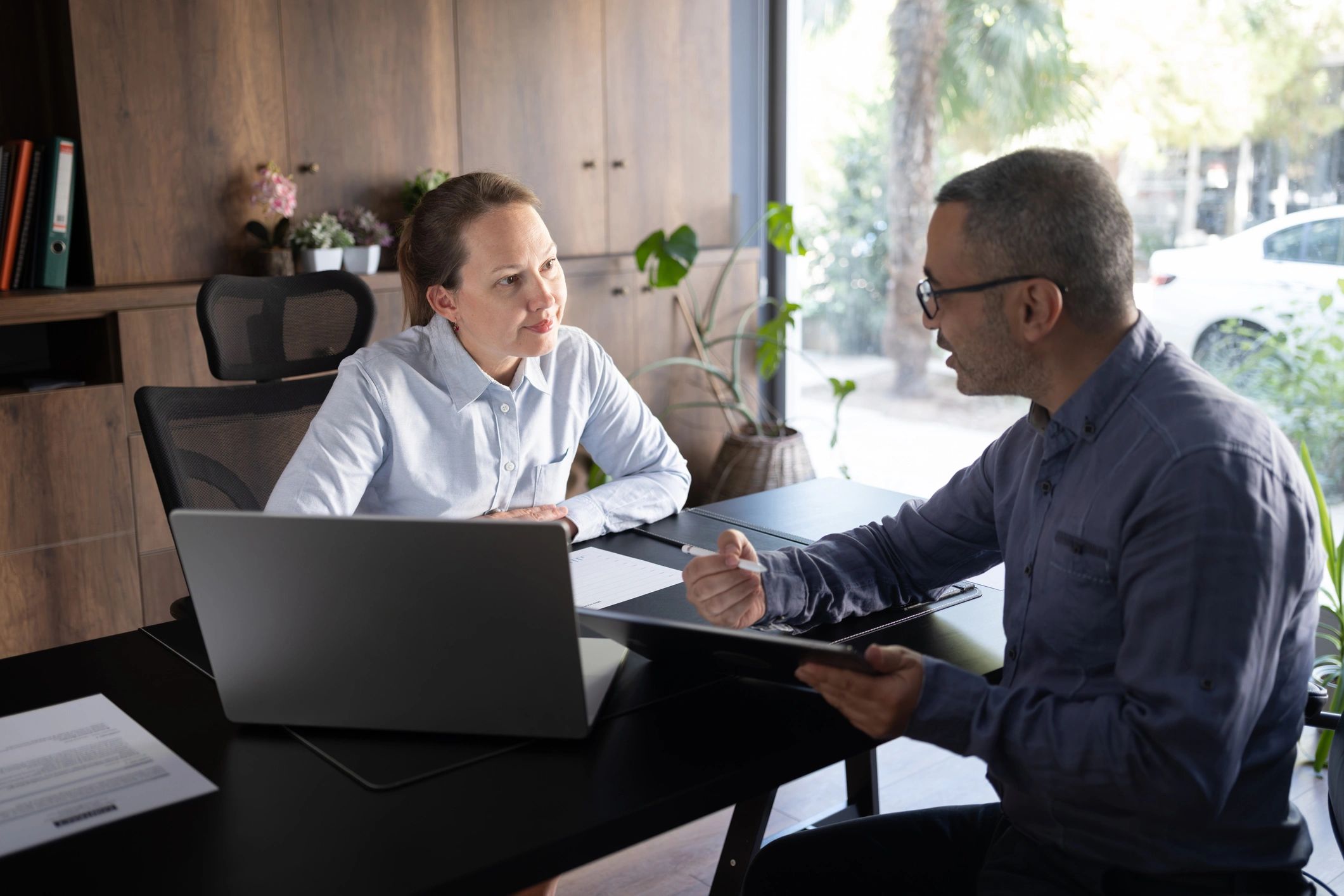 Business people discussing a project together